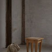 A pair of antique Danish pine stools from the late 19th century.