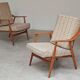 Pair of Boomerang-style armchairs in ecru beige fabric, 1960s.