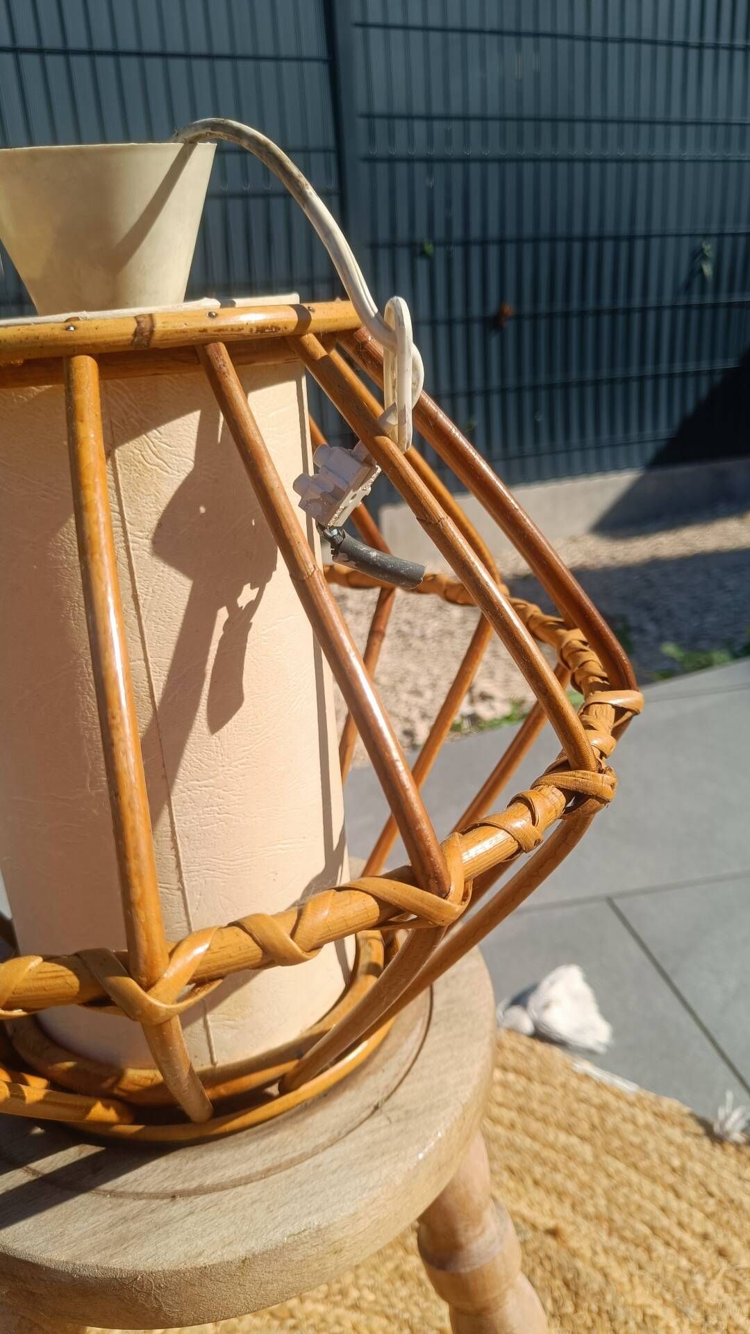 Vintage rattan and bamboo pendant light with removable shade.