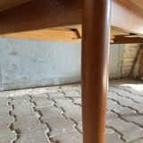 Extendable teak dining table