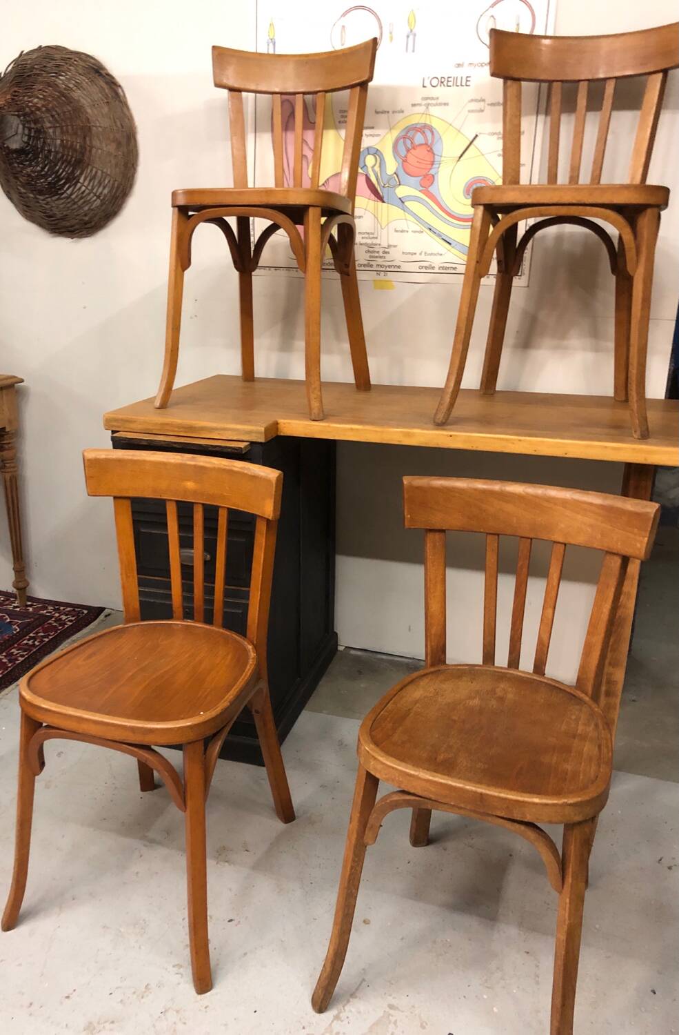 8 antique Baumann bistro chairs