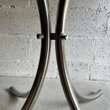 Oval table in smoked glass and chrome steel