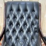 Fauteuil basculant Chesterfield en cuir noir