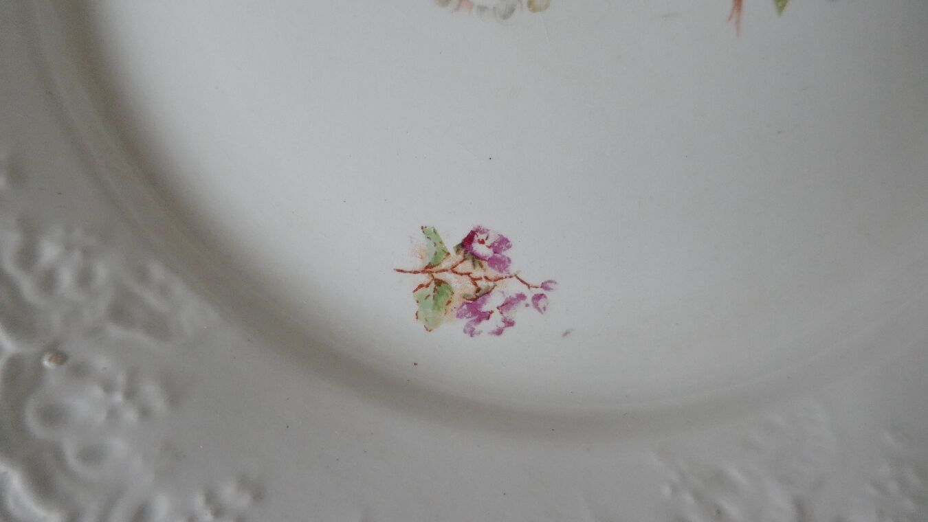 Antique plate with cherry blossom decoration