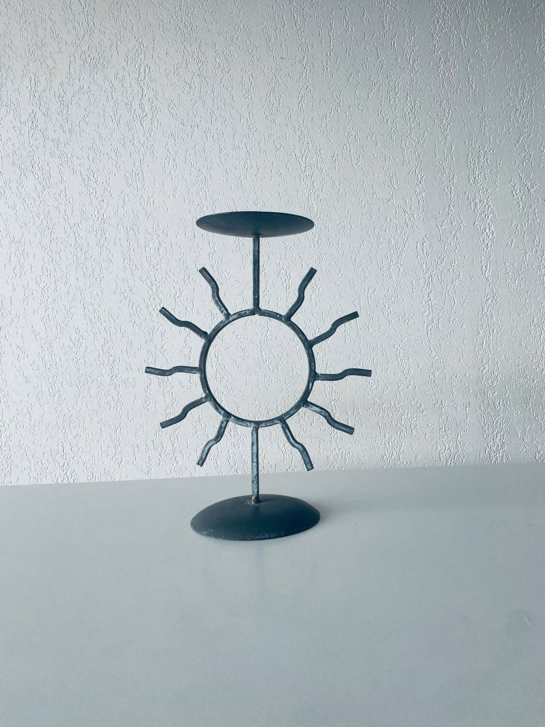 Iron sun candle holder