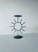 Iron sun candle holder