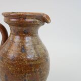 Brown speckled stoneware pitcher in very good condition