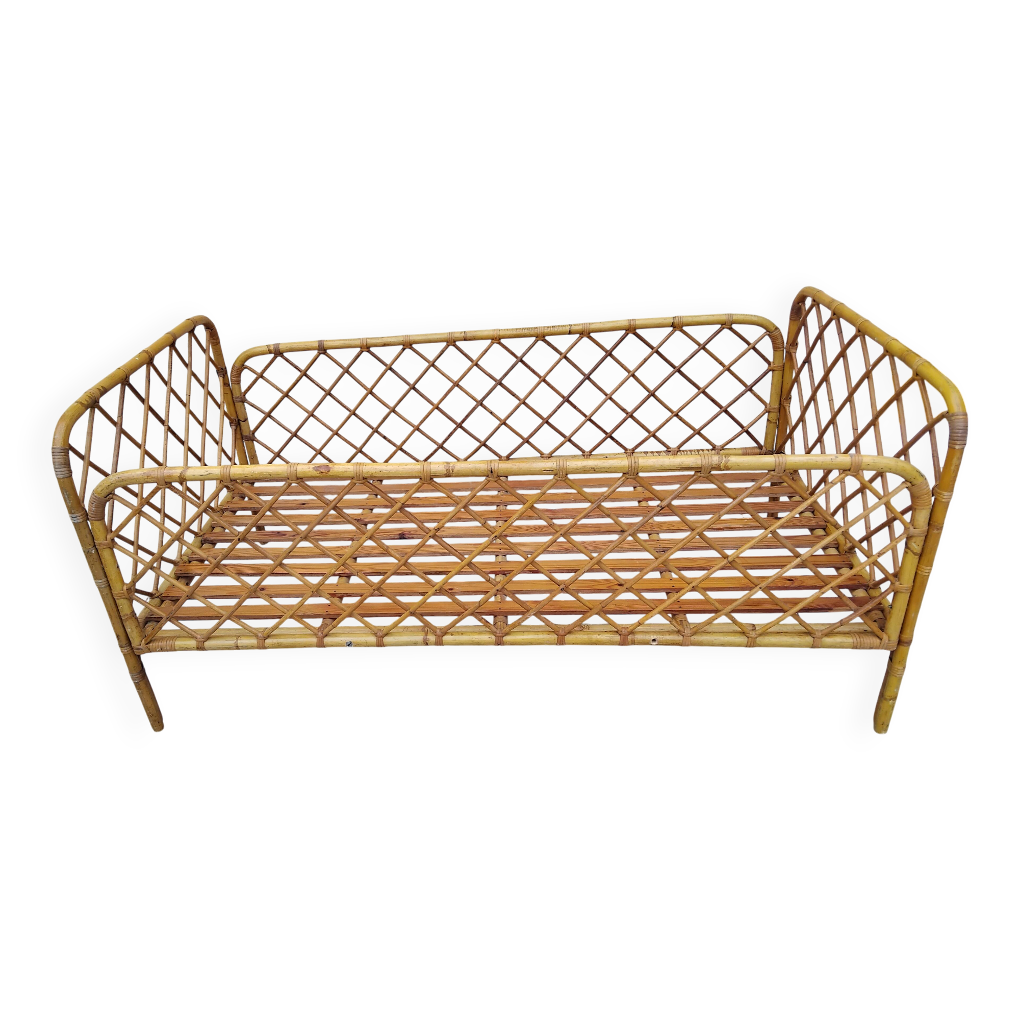 Vintage rattan child or baby bed