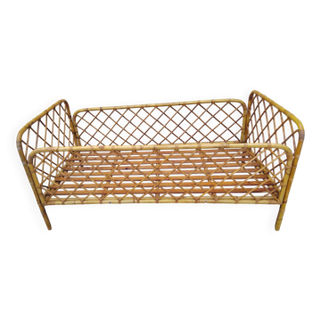 Vintage rattan child or baby bed
