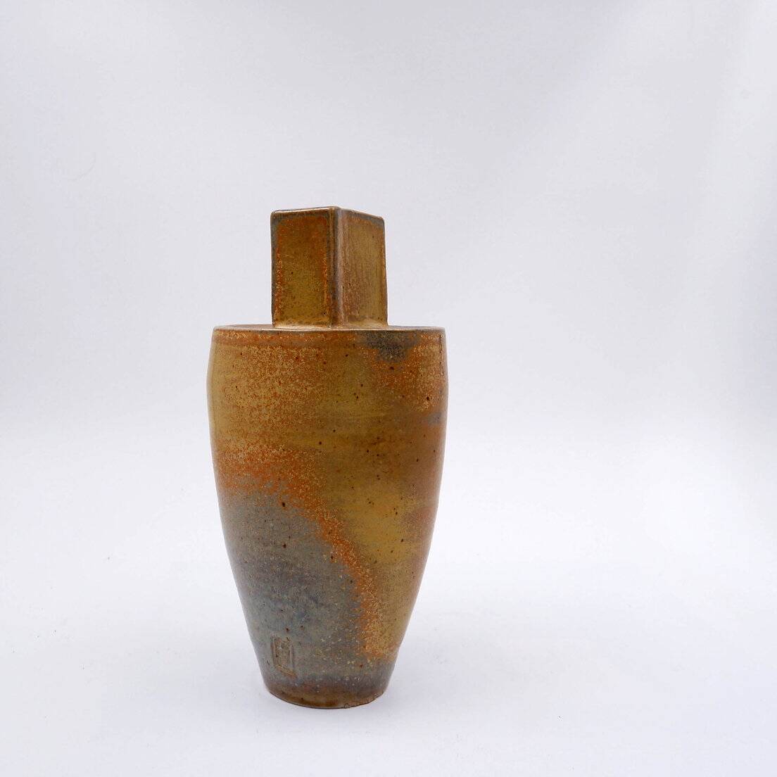 Vintage brown ceramic vase stamped "PV"