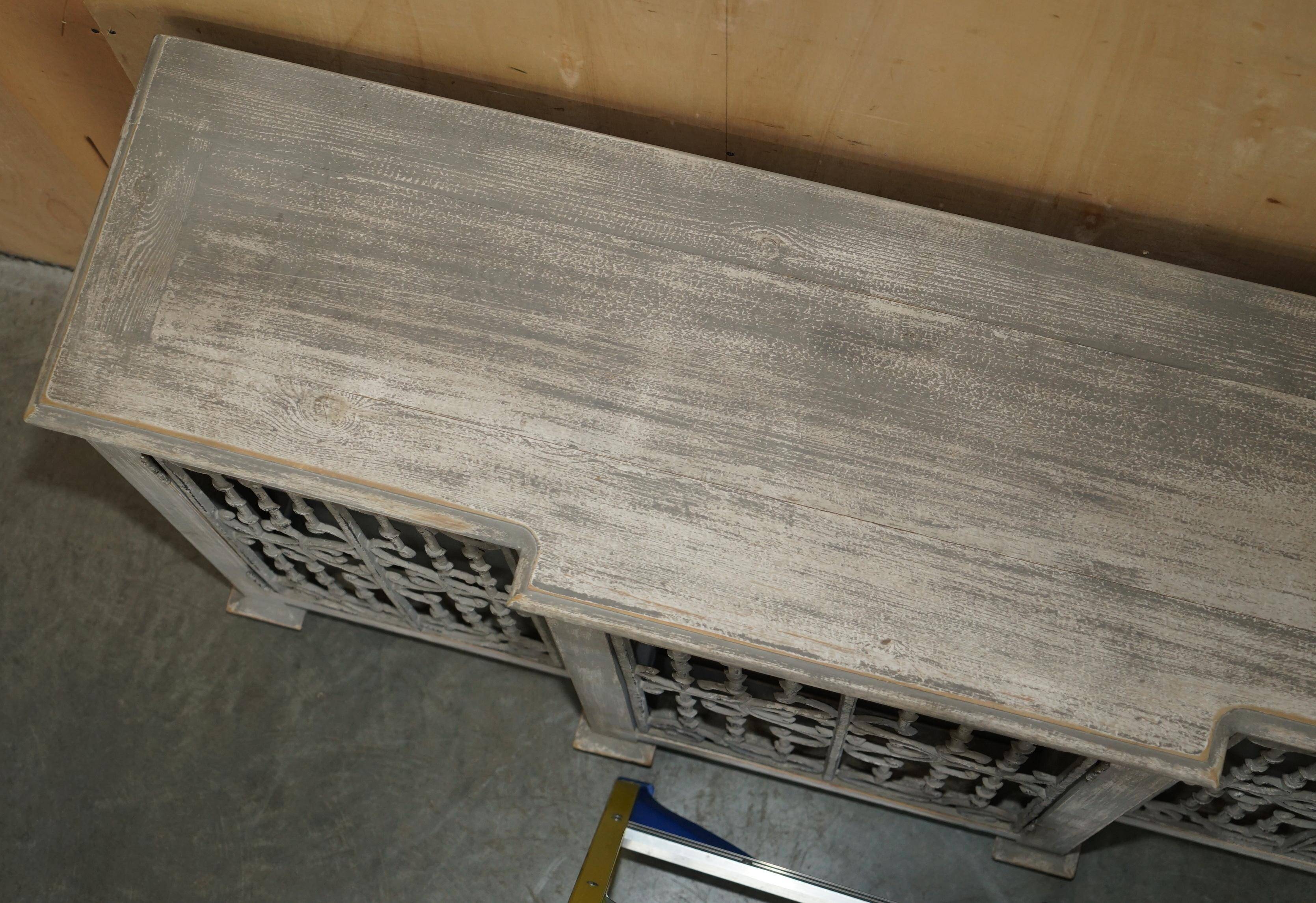 Vintage sideboard with wrought iron doors