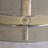 Round table in chromed metal and smoked glass