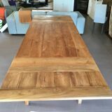 Teak table with extension cords