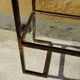 1970s console, minimalist design, burnished brass and glass, Mid-Century style.