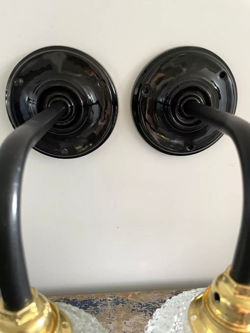 Pair of vintage electrified glass wall lamps