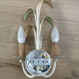 Vintage wrought iron wall sconce in the shape of a flower/leaf