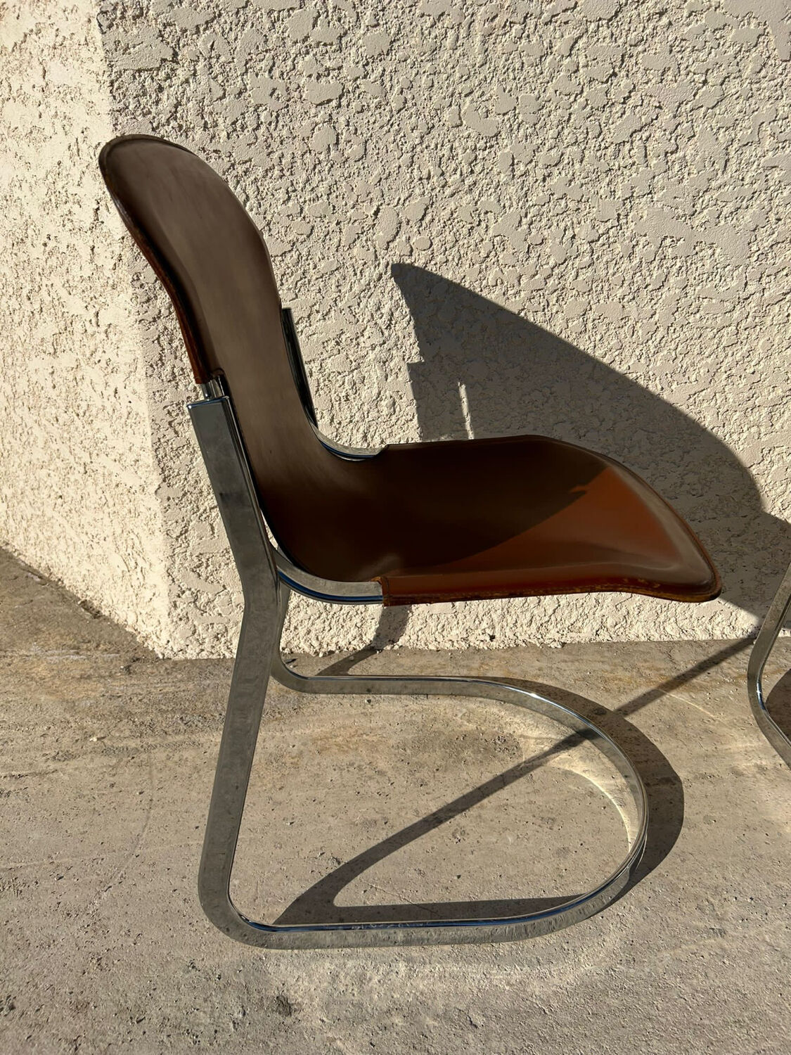 Pair of leather and chromed metal chairs year 70