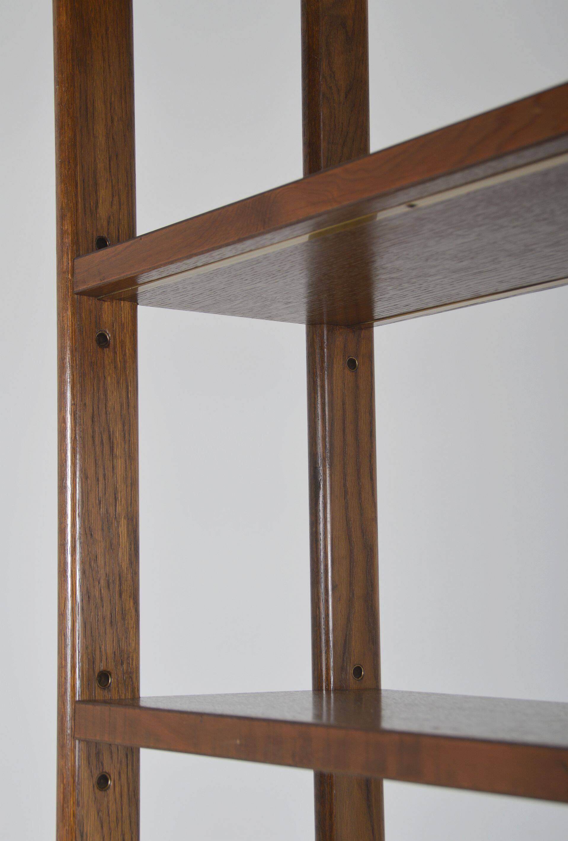 Danish freestanding wall rack with brass accents, 1960s