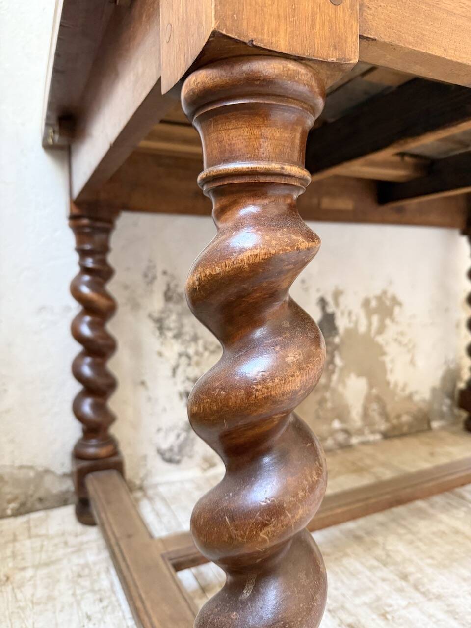 Paneled walnut desk with turned legs, 1900
