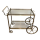 Neoclassical style rolling table in silvered brass
