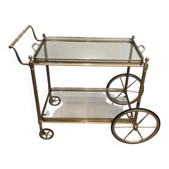 Neoclassical style rolling table in silvered brass