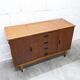 1960s teak sideboard with 4 drawers, 2 doors, and a mirror.