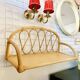 Rattan wall shelf