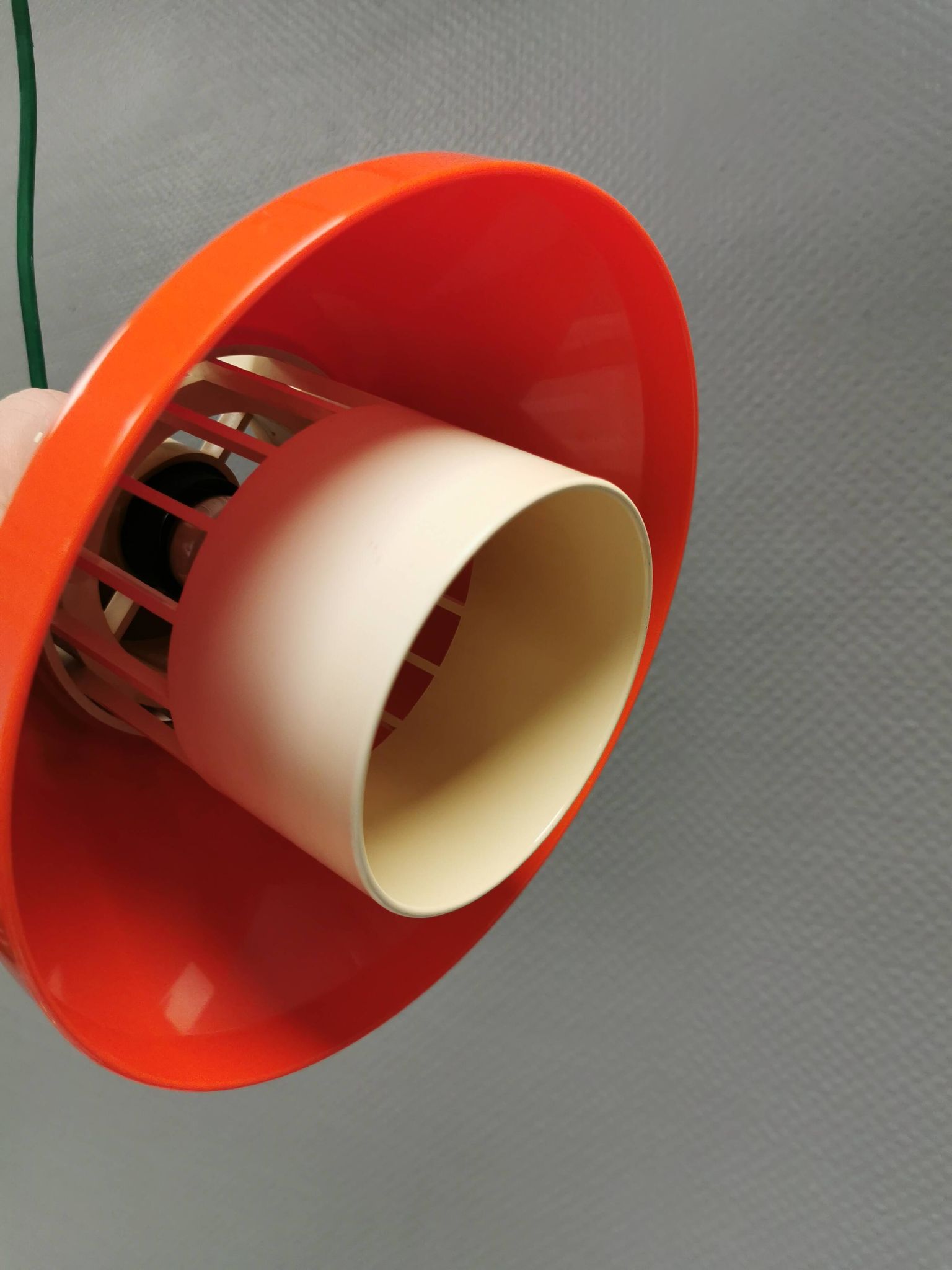An orange pendant lamp made from hard-pressed ABS plastic. Denmark 1970s