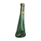 Old green molded glass bottle with rounded shape