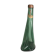 Old green molded glass bottle with rounded shape