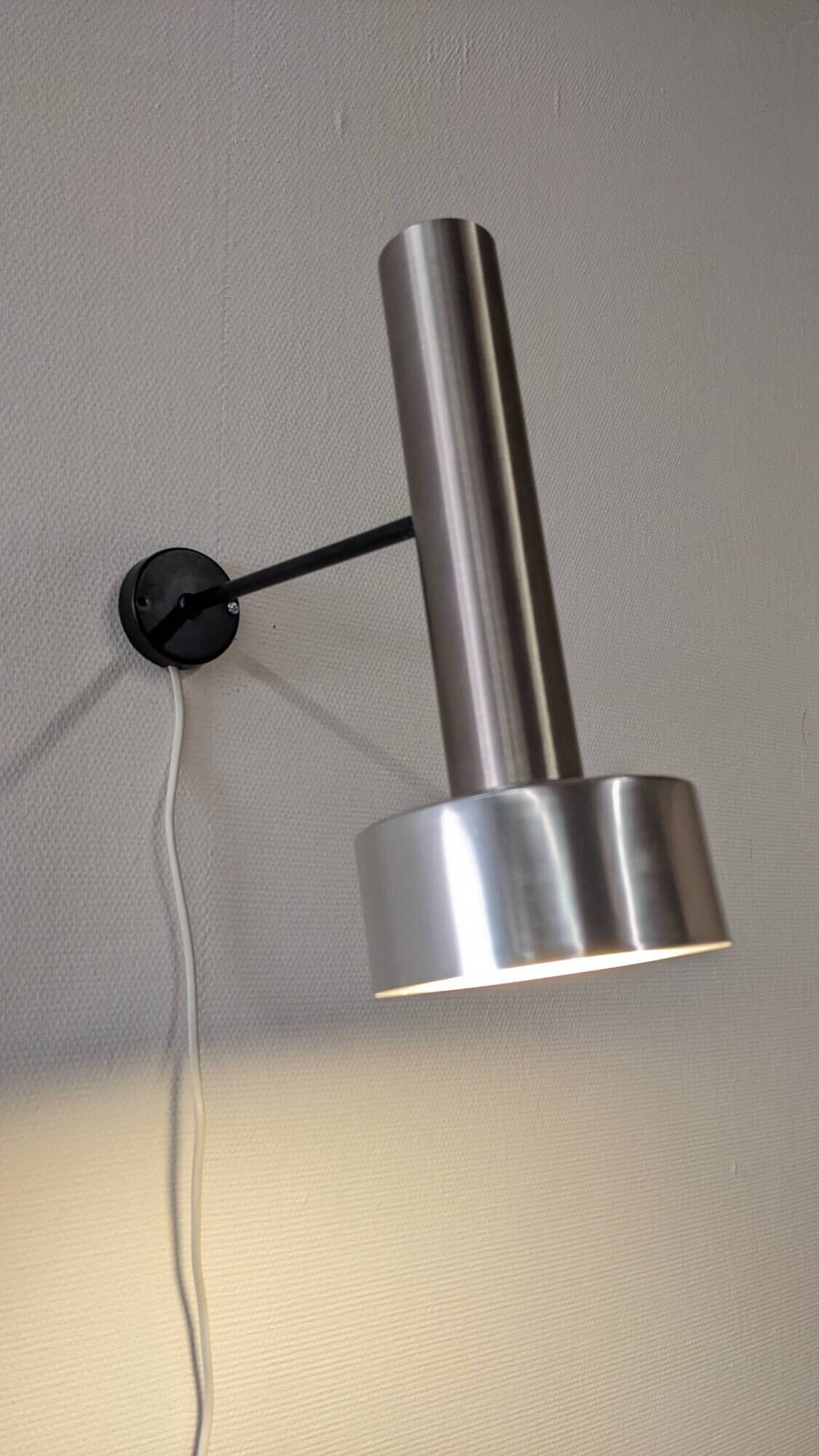 Pair of spot wall lights by R.J Caillette for Parscot, France circa 1960.