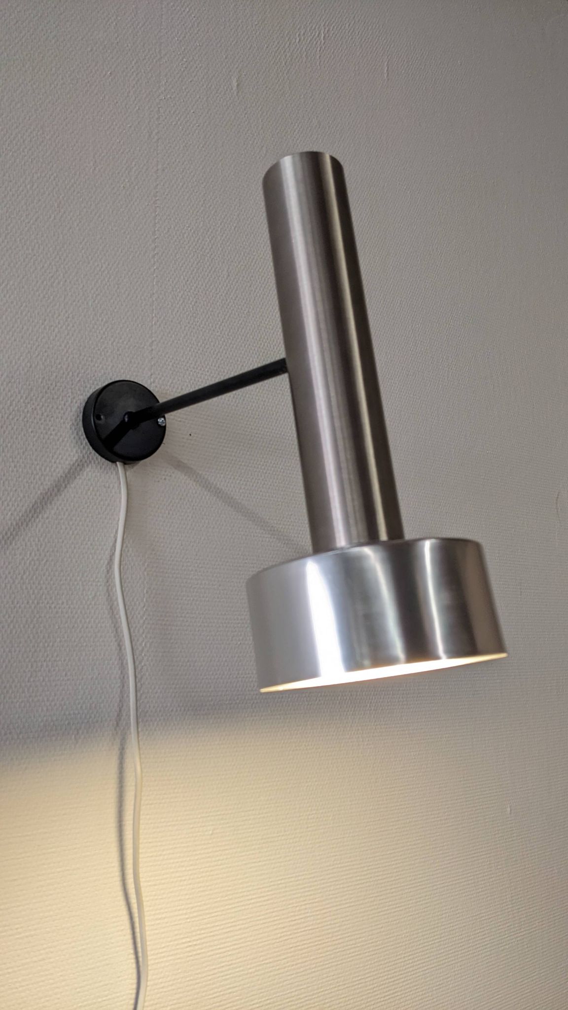 Pair of spot wall lights by R.J Caillette for Parscot, France circa 1960.