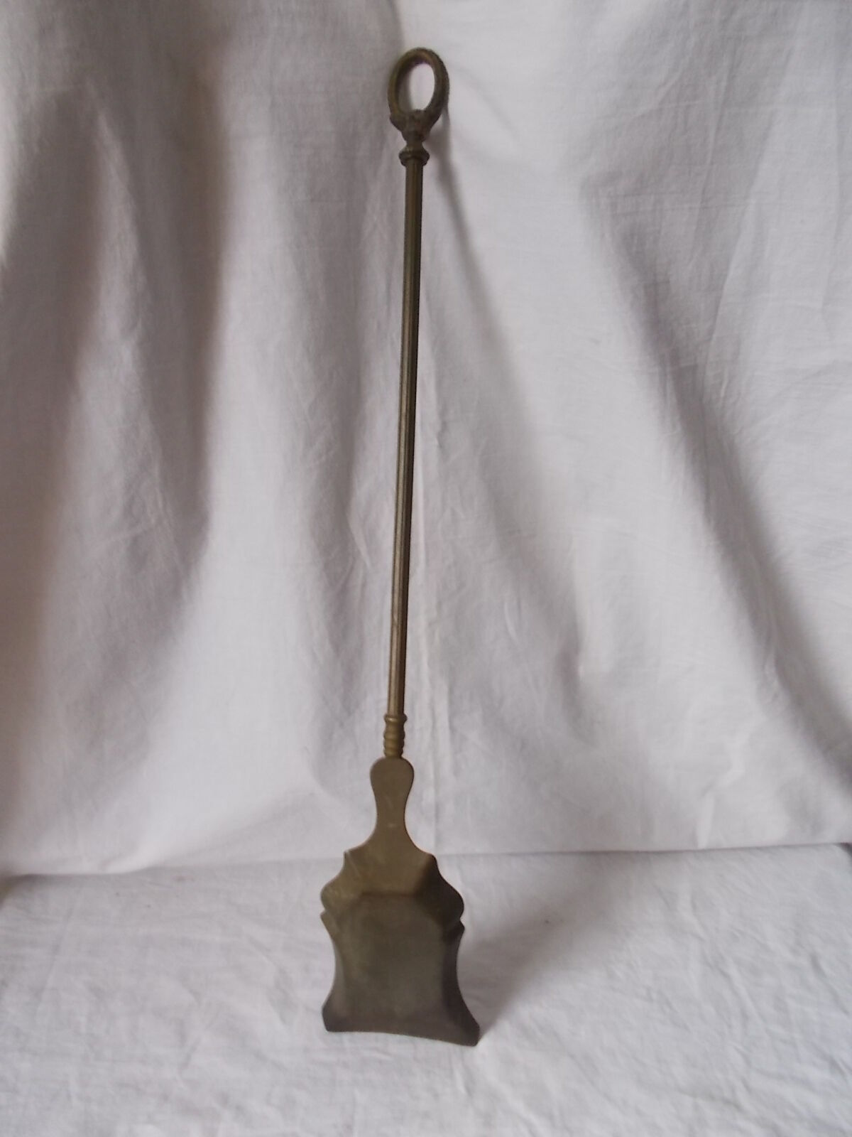 Shovel for the old brass fireplace