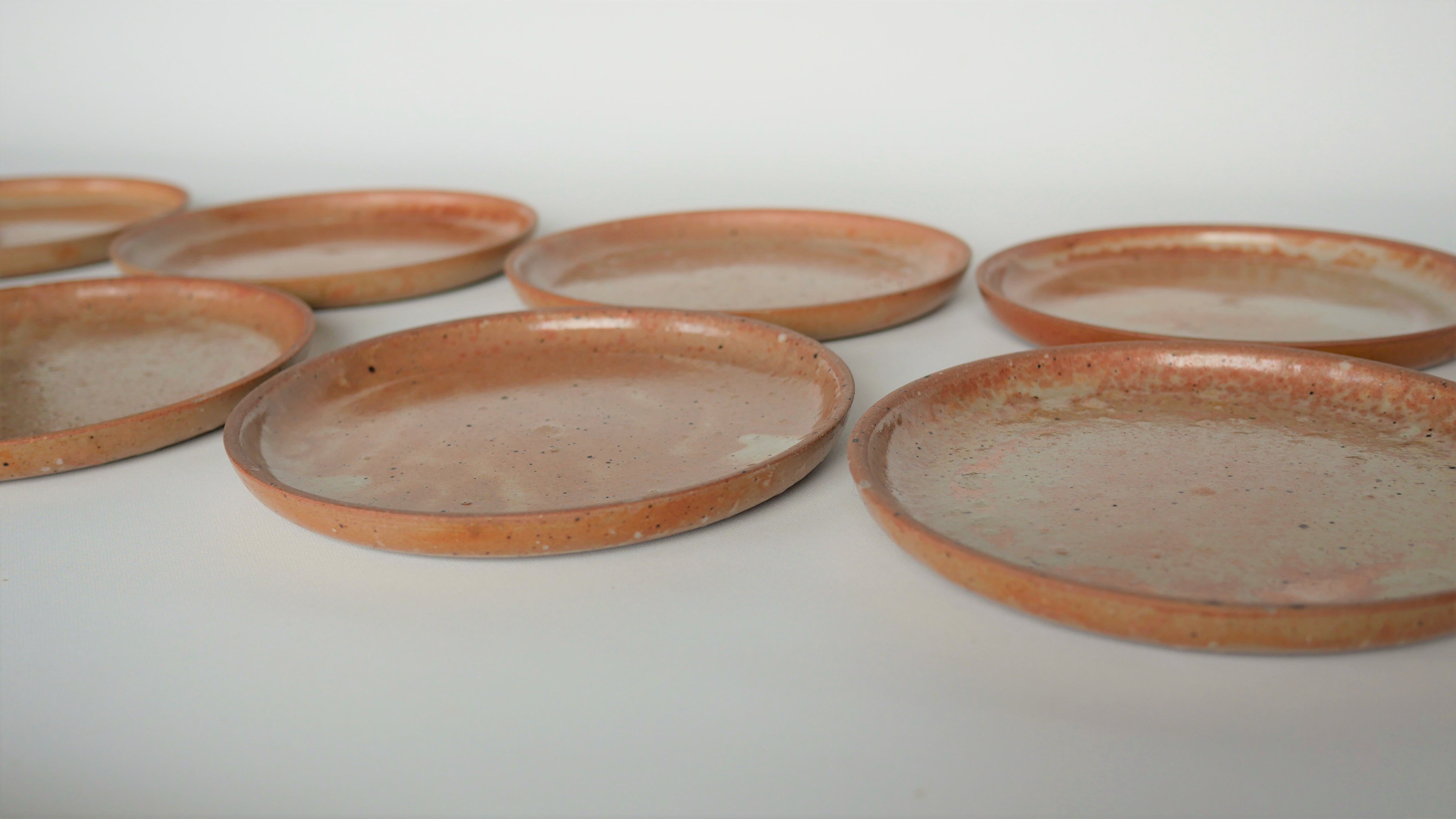 Series of 10 vintage sandstone plates