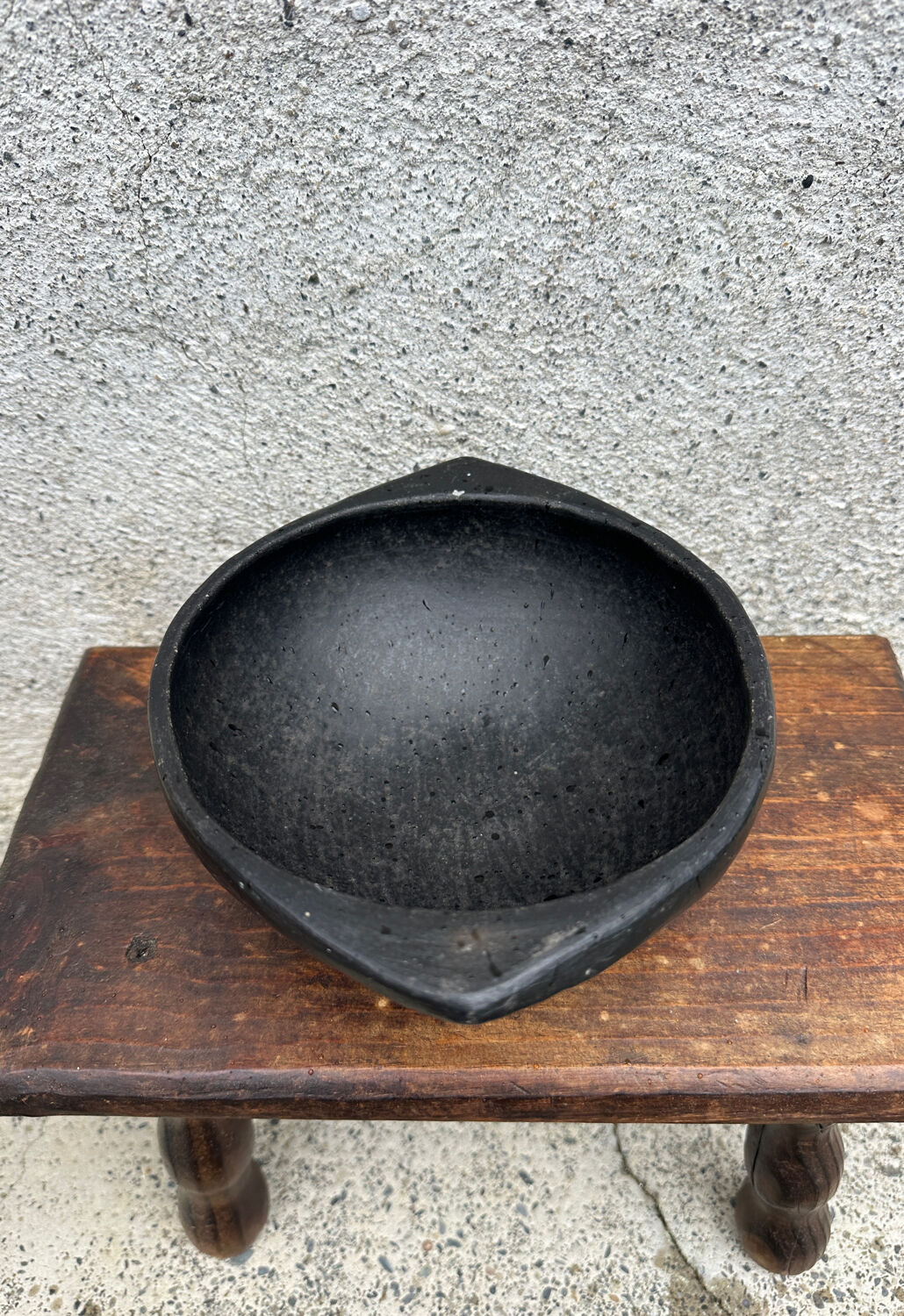Ancient bowl, ethnic pottery in Colombian La Chamba ceramic.