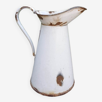 White enamelled pitcher