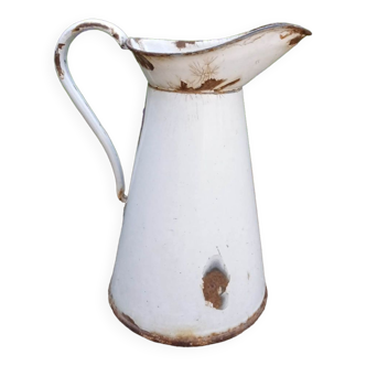 White enamelled pitcher