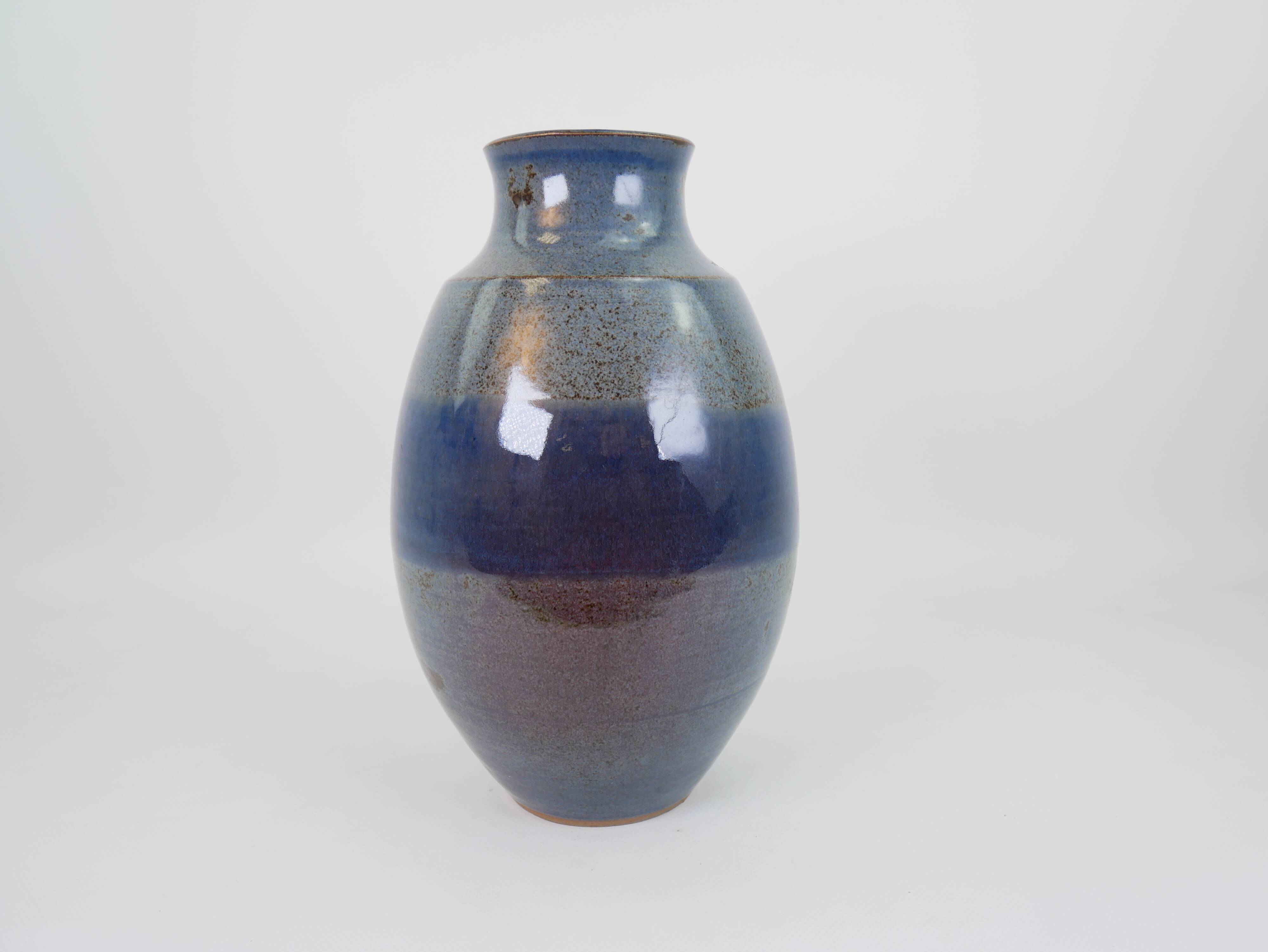 Large blue glazed ceramic vase signed under the base