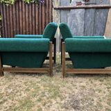 Duo of vintage armchairs with green fabrics.