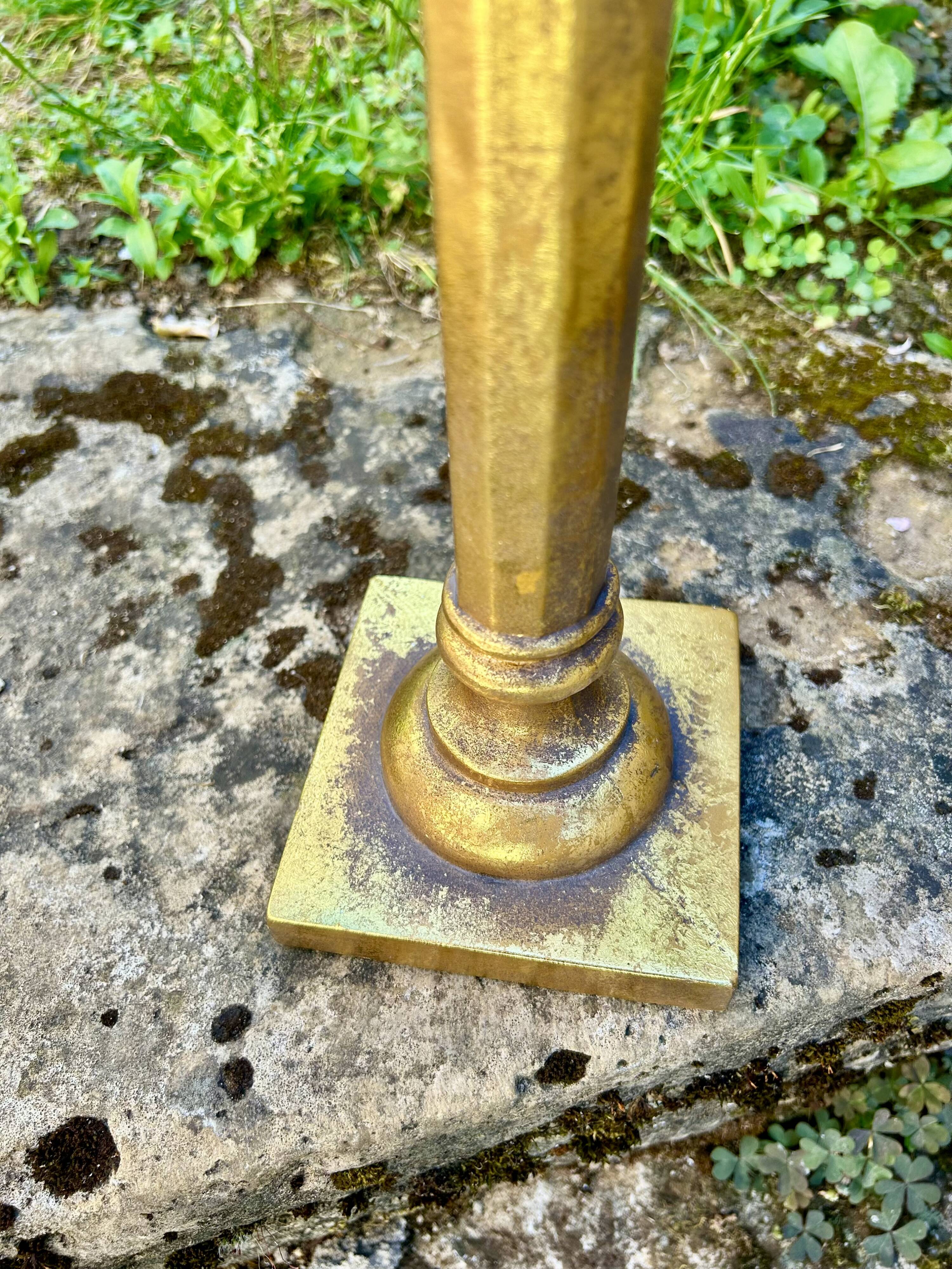 Pair of large candlesticks with cherubs