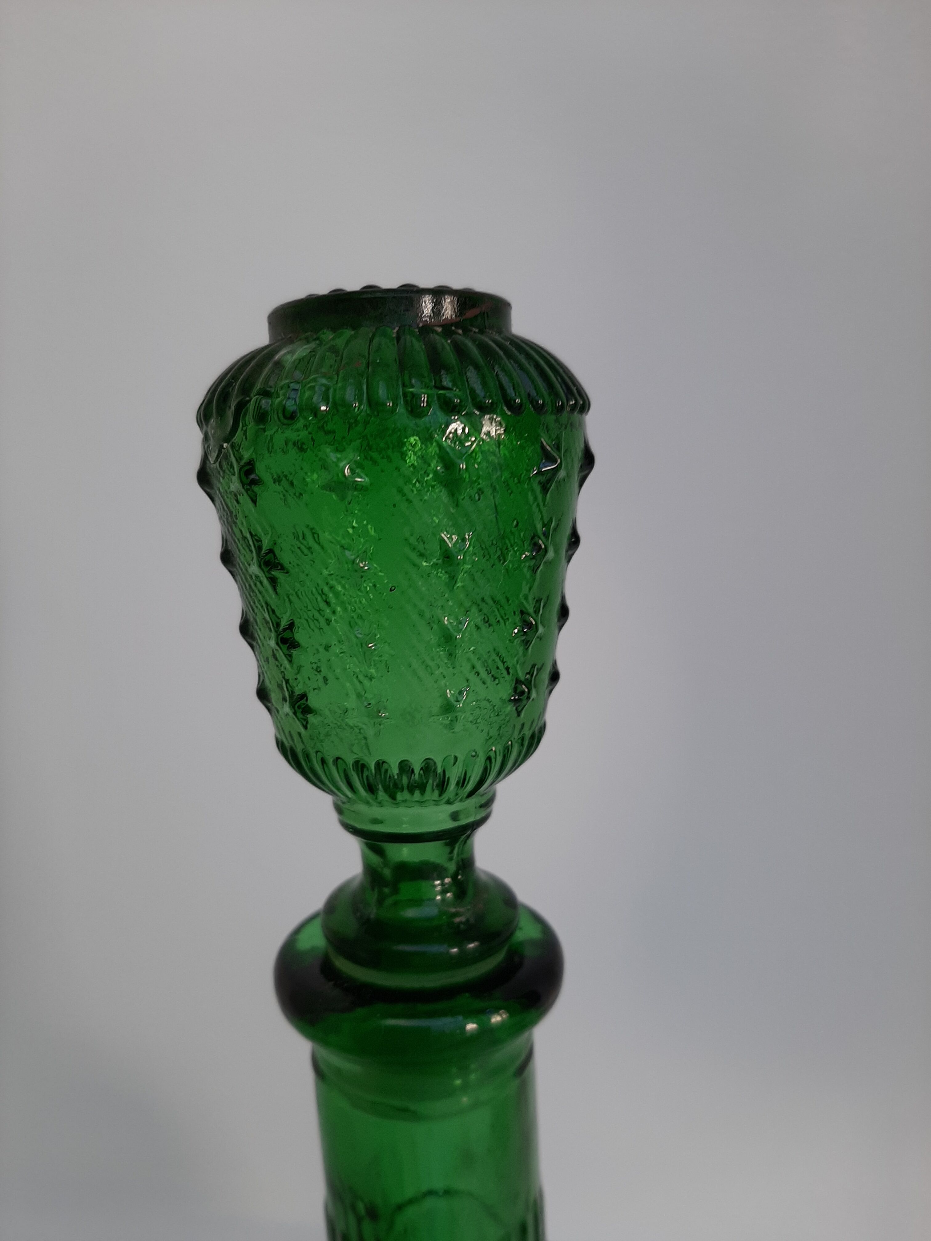 Empoli green glass bottle, zodiac signs