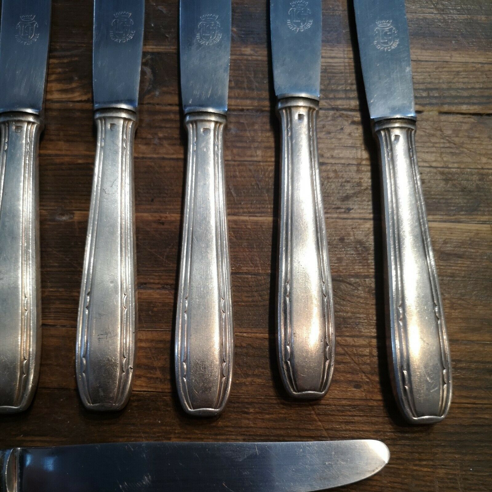Series of 10 knives with silver metal stainless steel blade