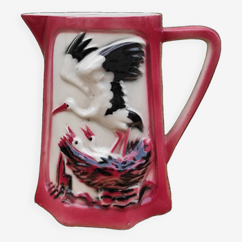 French vintage pitcher of St Clément, with a stork feeding its babies