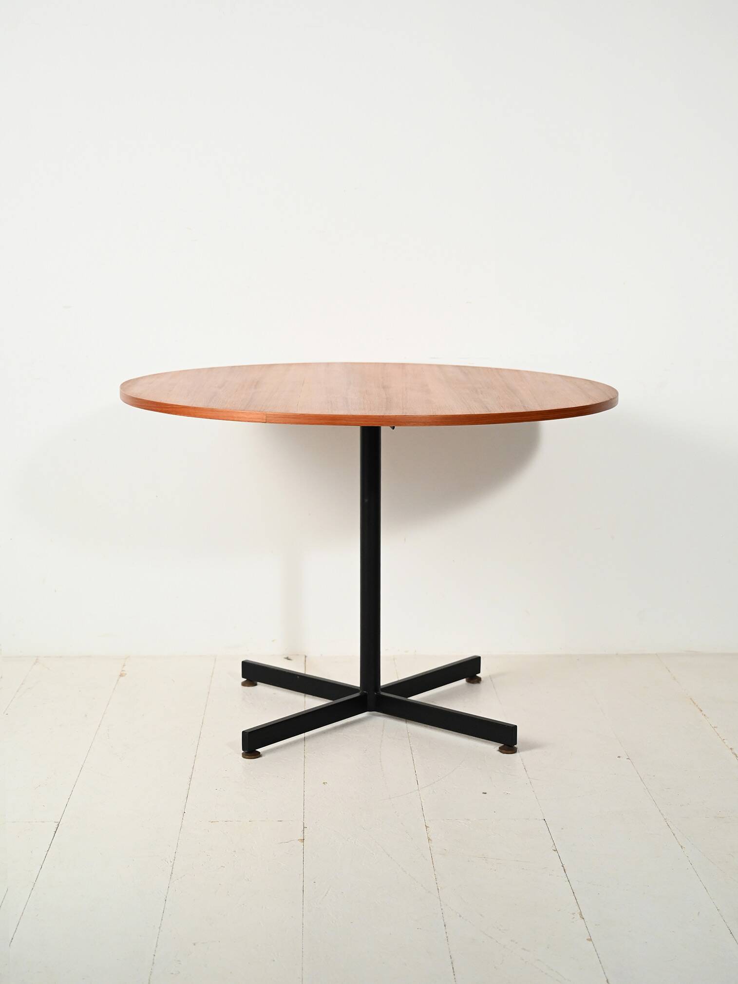 Round Scandinavian teak table with metal base