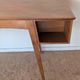 1950s oak double-sided desk with compass legs.