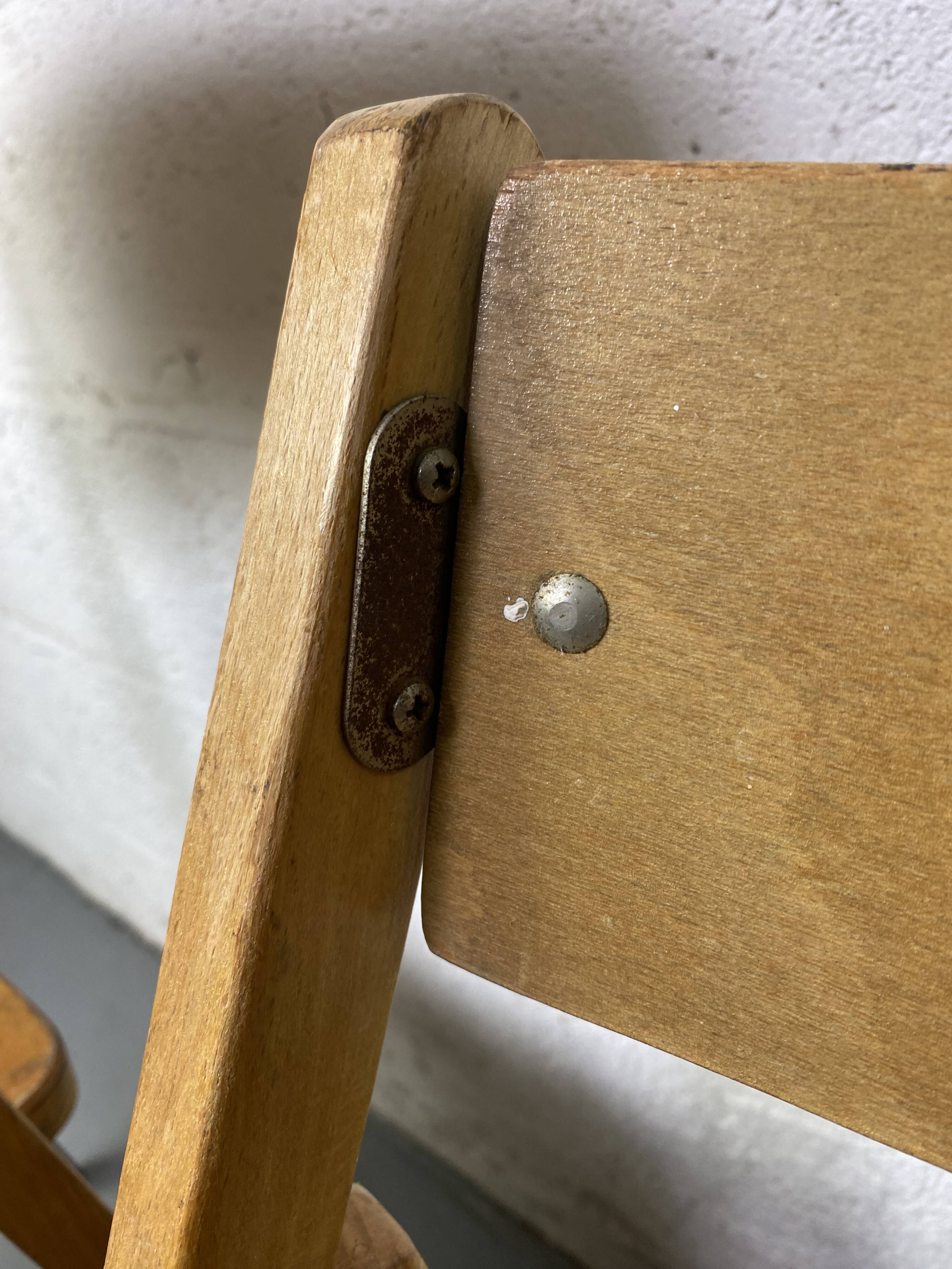 Pair of mismatched wooden folding chairs