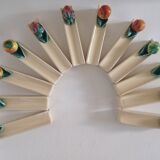 Set of 12 slip knife holders in their case