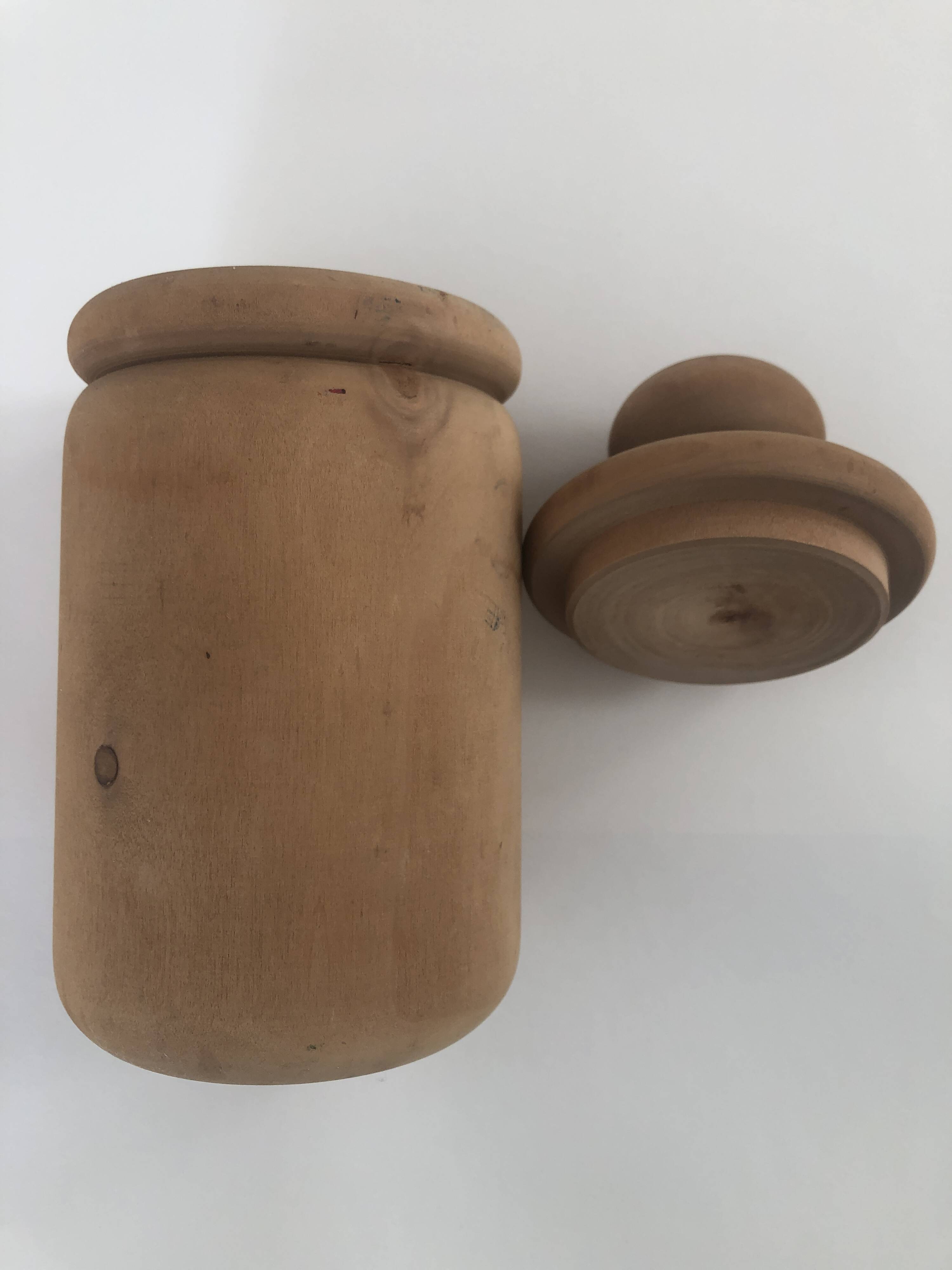 large pot with turned wooden lid