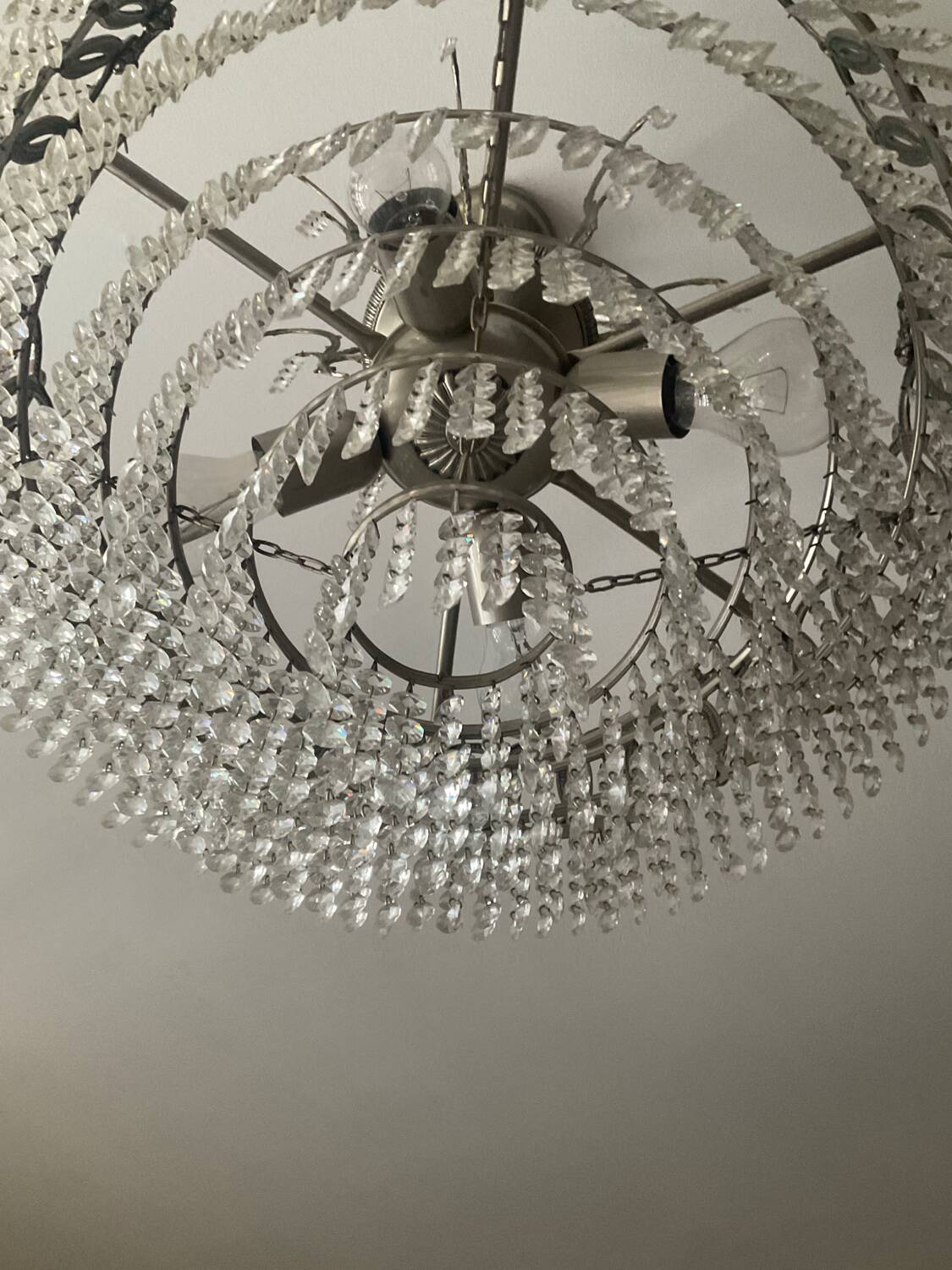 Cascading chandelier with crystal and silvered bronze pendants