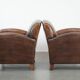 Characterful set of two vintage sheepskin armchairs with beautiful colours